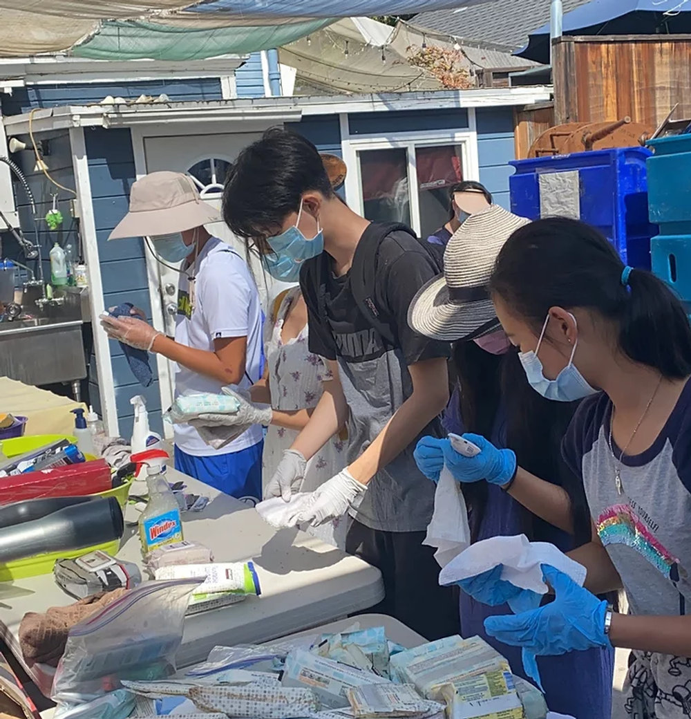 Bridge California volunteers sorting donations
